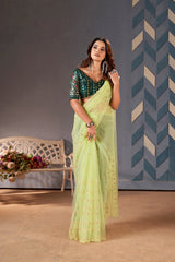 Pista green  colour embroidery sequence blouse with moti sequence work net saree