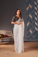 White colour embroidery sequence blouse with moti sequence work net saree