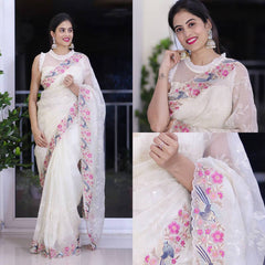 Beautiful sequence embroidery work on white saree
