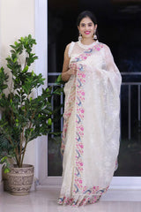 Beautiful sequence embroidery work on white saree