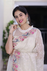 Beautiful sequence embroidery work on white saree