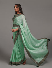 Beautiful lace border designer pista green saree with sequence embroidery work blouse