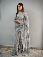 Beautiful embroidery with mirror and diamond work net saree