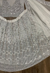 White colour heavy sequence embroidery work lehenga choli