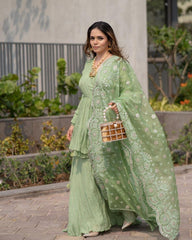 Pista green colour embroidery work designer suit
