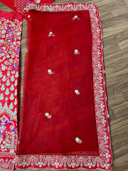 Red colour embroidered silk lehenga choli