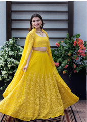 Beautiful yellow colour embroidery work lehenga choli